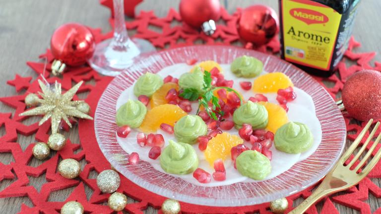 Carpaccio de radis, grenade clémentines et creme d'avocats